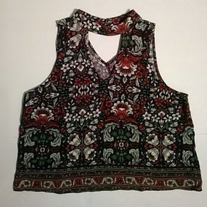 Floral sleeveless blouse with triangle cut outs